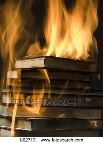 stack of books on fire View Large Photo Image Stock Image - stack of books on fire. Fotosearch