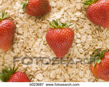 strawberries and oats View Large Photo Image Stock Photo - strawberries and oats. Fotosearch