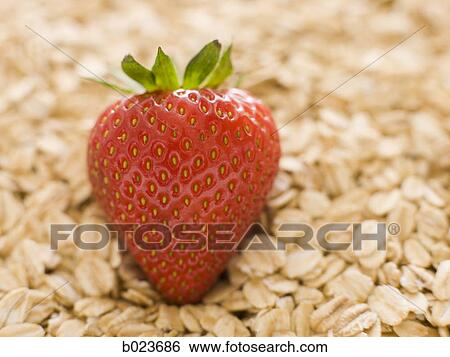 Stock Photograph - strawberries and oats. Fotosearch