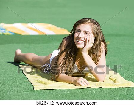 teenage girl in a white swimsuit View Large Photo Image Stock Image - teenage girl in a white swimsuit. Fotosearch
