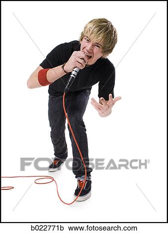 teenage rock singer with a microphone View Large Photo Image Stock Image - teenage rock singer with a microphone. Fotosearch