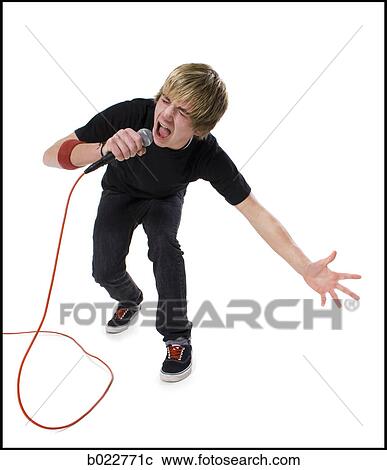 teenage rock singer with a microphone View Large Photo Image Stock Image - teenage rock singer with a microphone. Fotosearch