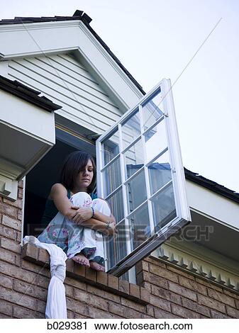 teenager climbing out of her bedroom window View Large Photo Image Stock Image - teenager climbing out of her bedroom window. Fotosearch
