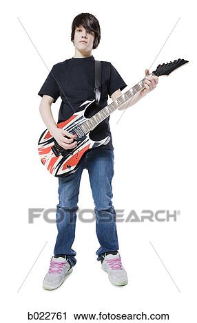 teenager with an electric guitar View Large Photo Image Stock Image - teenager with an electric guitar. Fotosearch