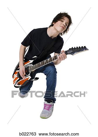 teenager with an electric guitar View Large Photo Image Stock Image - teenager with an electric guitar. Fotosearch