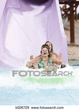 Stock Photo - teenagers at a waterpark. Fotosearch