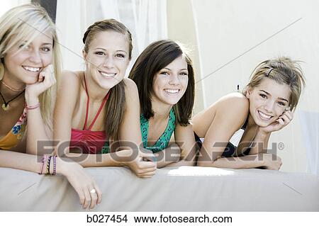teenagers in a poolside cabana View Large Photo Image Picture - teenagers in a poolside cabana. Fotosearch