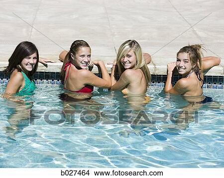 teenagers in a swimming pool View Large Photo Image Picture - teenagers in a swimming pool. Fotosearch
