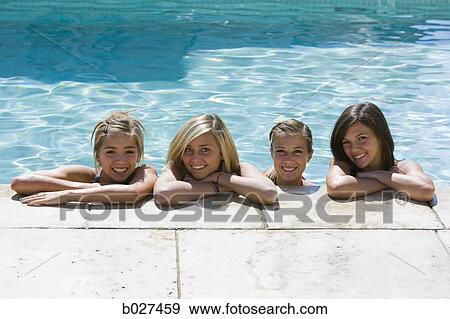 teenagers in a swimming pool View Large Photo Image Stock Photo - teenagers in a swimming pool. Fotosearch
