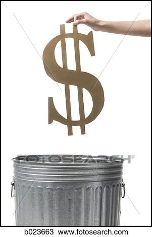 throwing dollar symbol in the trash View Large Photo Image Stock Image - throwing dollar symbol in the trash. Fotosearch