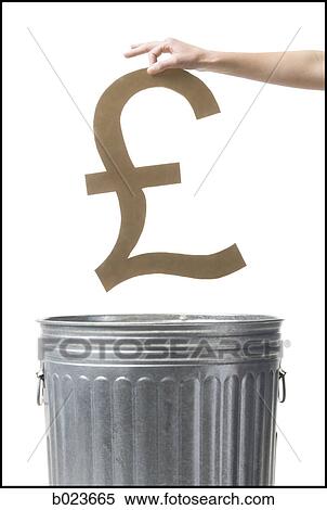 Stock Photography - throwing pound symbol in the trash. Fotosearch