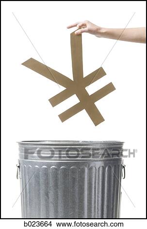 throwing yen symbol in the trash View Large Photo Image Picture - throwing yen symbol in the trash. Fotosearch