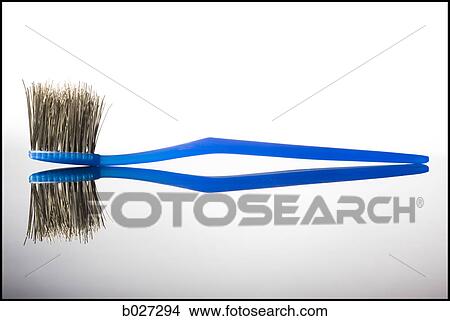 toothbrush with the bristles made of metal wires View Large Photo Image Picture - toothbrush with the bristles made of metal wires. Fotosearch