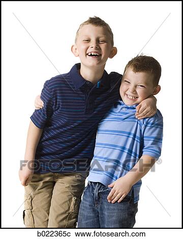 Stock Image - two boys looking at the camera. Fotosearch