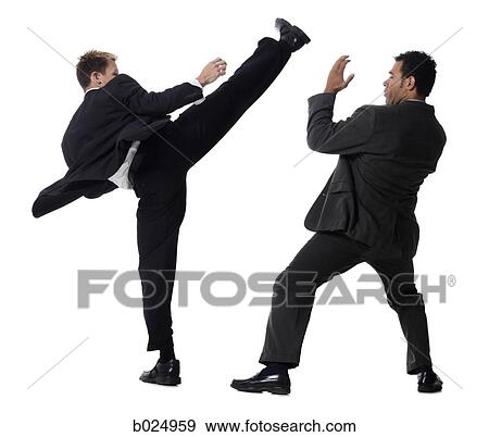 Stock Photo - two businessmen fighting. Fotosearch