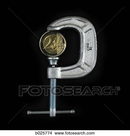 two euro coin in a metal clamp View Large Photo Image Picture - two euro coin in a metal clamp. Fotosearch