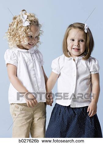 two little girls View Large Photo Image Stock Image - two little girls. Fotosearch
