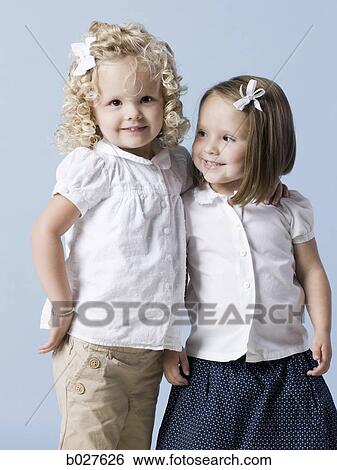 two little girls View Large Photo Image Stock Photograph - two little girls. Fotosearch