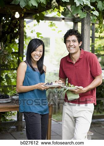 two people enjoying an outdoor meal View Large Photo Image Stock Image - two people enjoying an outdoor meal. Fotosearch