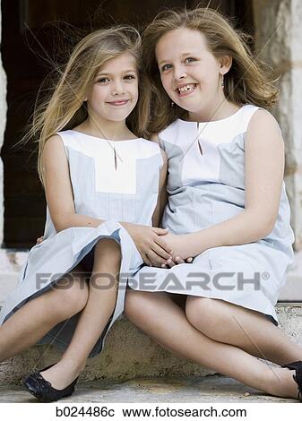 Stock Image - two sisters. Fotosearch