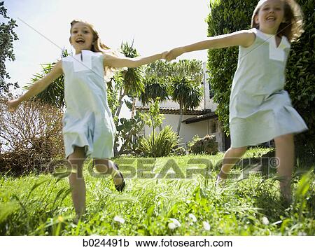 Stock Image - two sisters. Fotosearch