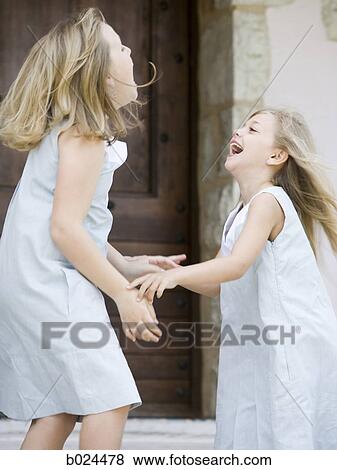 Stock Photo - two sisters. Fotosearch