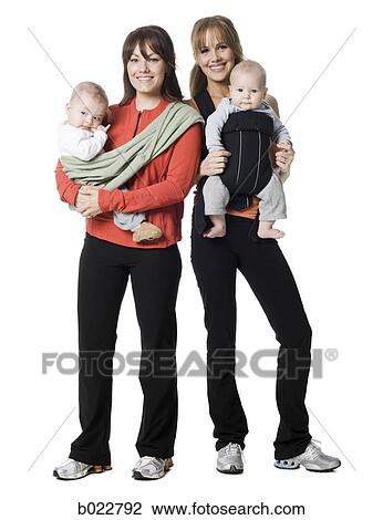 Stock Image - two women and their babies. Fotosearch