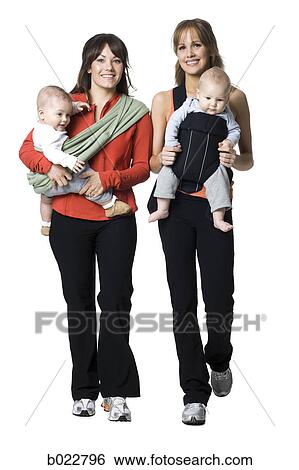 Stock Photograph - two women and their babies. Fotosearch