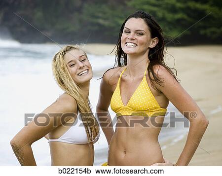 two young women at the beach View Large Photo Image Stock Image - two young women at the beach. Fotosearch