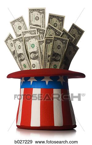 uncle sam's top hat full of dollar bills View Large Photo Image Stock Photo - uncle sam's top hat full of dollar bills. Fotosearch