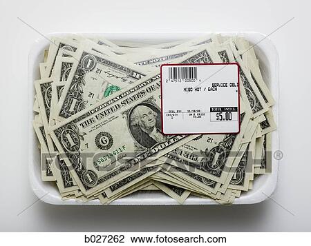 Stock Image - us dollars in a supermarket shrinkwrap package. Fotosearch