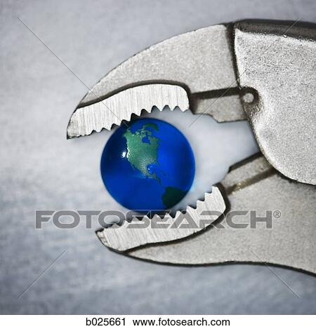 vice grip pliers crushing the earth View Large Photo Image Stock Image - vice grip pliers crushing the earth. Fotosearch