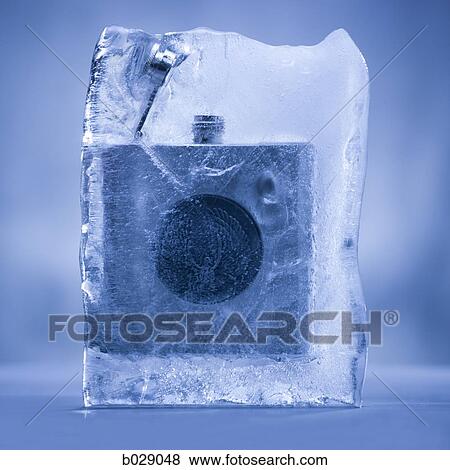 whiskey flask frozen in a block of ice View Large Photo Image Stock Photo - whiskey flask frozen in a block of ice. Fotosearch