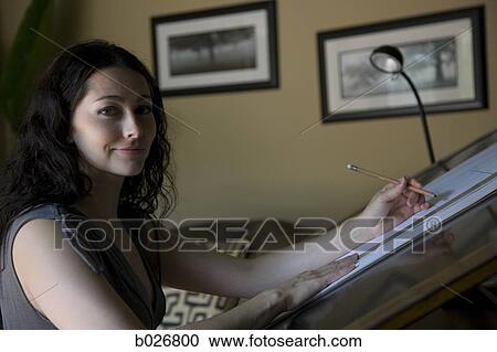 woman at a drafting table View Large Photo Image Stock Image - woman at a drafting table. Fotosearch