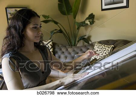 Stock Photo - woman at a drafting table. Fotosearch