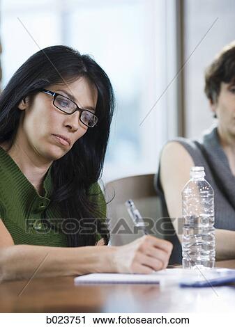 Stock Image - woman at work. Fotosearch