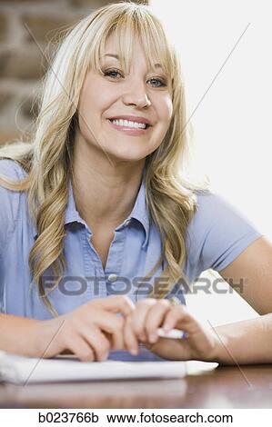 Stock Image - woman at work. Fotosearch