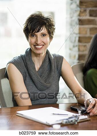 Stock Photo - woman at work. Fotosearch