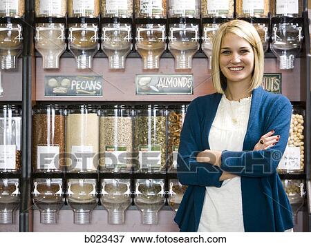 woman buying nuts at the supermarket View Large Photo Image Stock Photo - woman buying nuts at the supermarket. Fotosearch