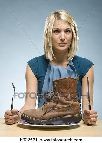 woman eating a boot View Large Photo Image Stock Image - woman eating a boot. Fotosearch