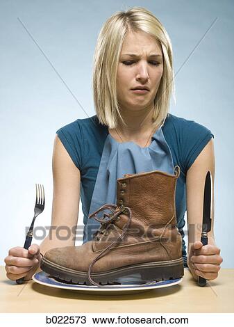 woman eating a boot View Large Photo Image Stock Image - woman eating a boot. Fotosearch