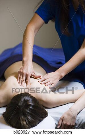 woman getting a massage View Large Photo Image Stock Photo - woman getting a massage. Fotosearch