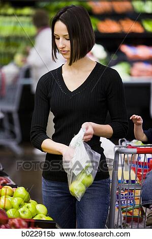 woman grocery shopping View Large Photo Image Stock Image - woman grocery shopping. Fotosearch