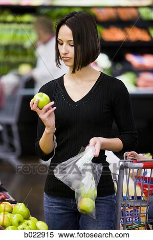 woman grocery shopping View Large Photo Image Stock Photography - woman grocery shopping. Fotosearch