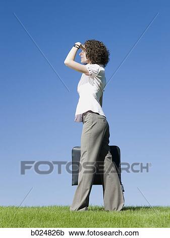 woman holding a briefcase View Large Photo Image Stock Image - woman holding a briefcase. Fotosearch