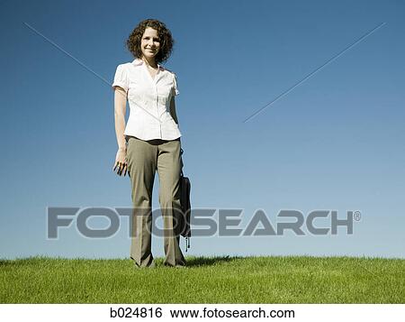 Stock Photograph - woman holding a briefcase. Fotosearch