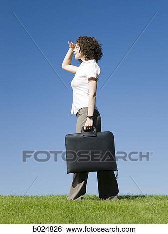 woman holding a briefcase View Large Photo Image Stock Photograph - woman holding a briefcase. Fotosearch