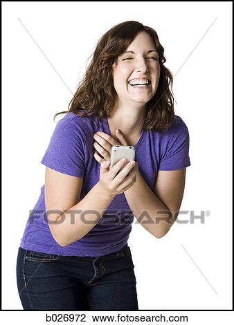woman holding a cell phone View Large Photo Image Stock Image - woman holding a cell phone. Fotosearch