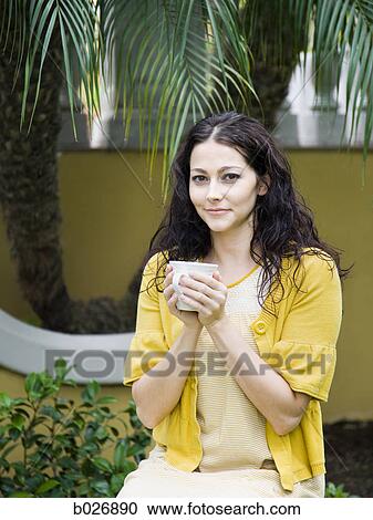 woman holding a mug View Large Photo Image Stock Image - woman holding a mug. Fotosearch