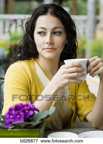 woman holding a mug View Large Photo Image Stock Photo - woman holding a mug. Fotosearch